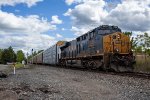 CSX 3125 leads a freight north on the Saginaw Sub